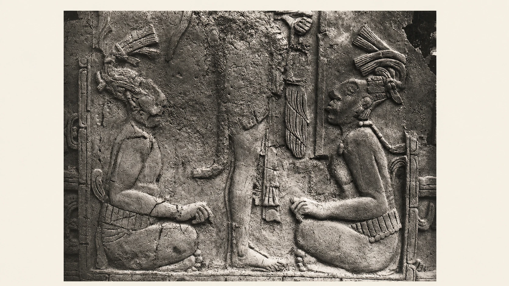 Stone relief with seated figures